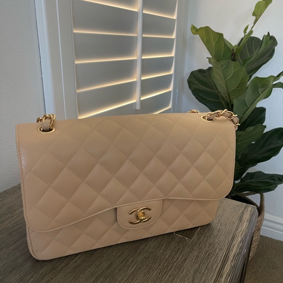 CHANEL Handbags - Jumbo classic caviar beige Chanel bag